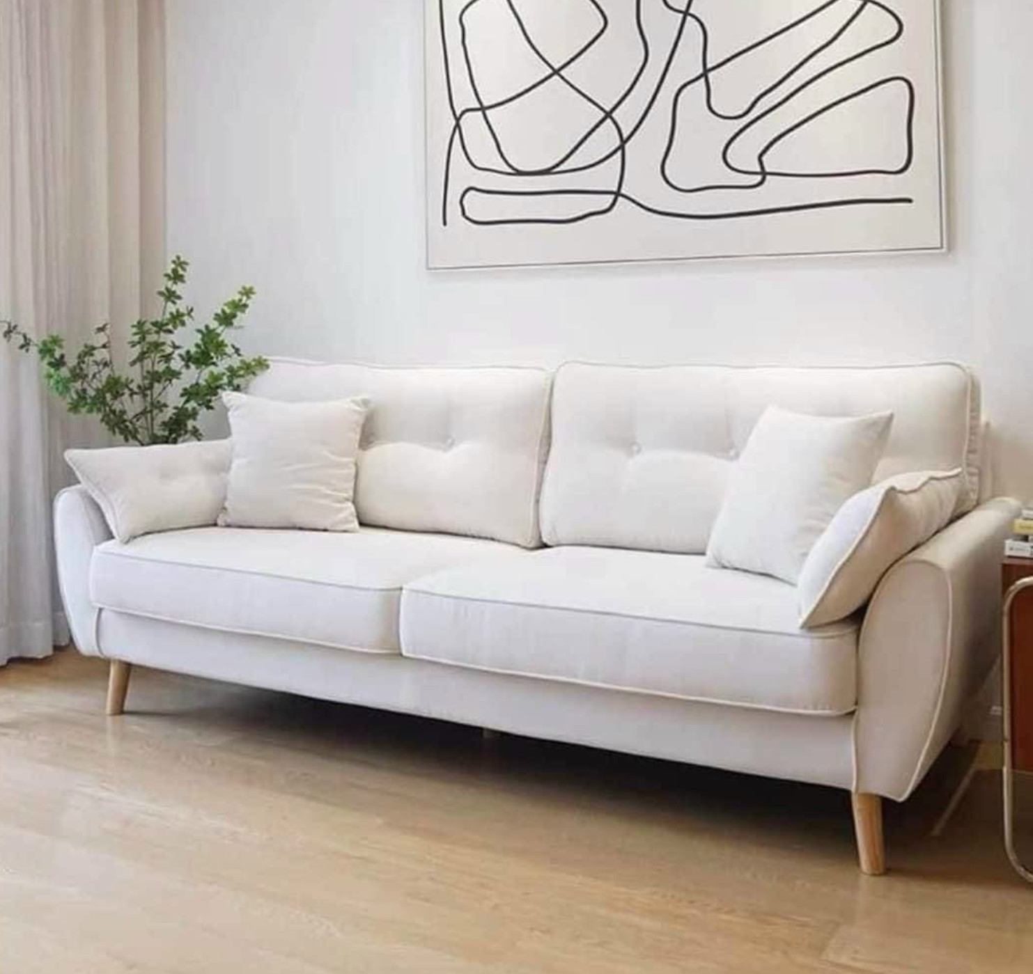 Thiết kế sofa văng làm từ vải nhung